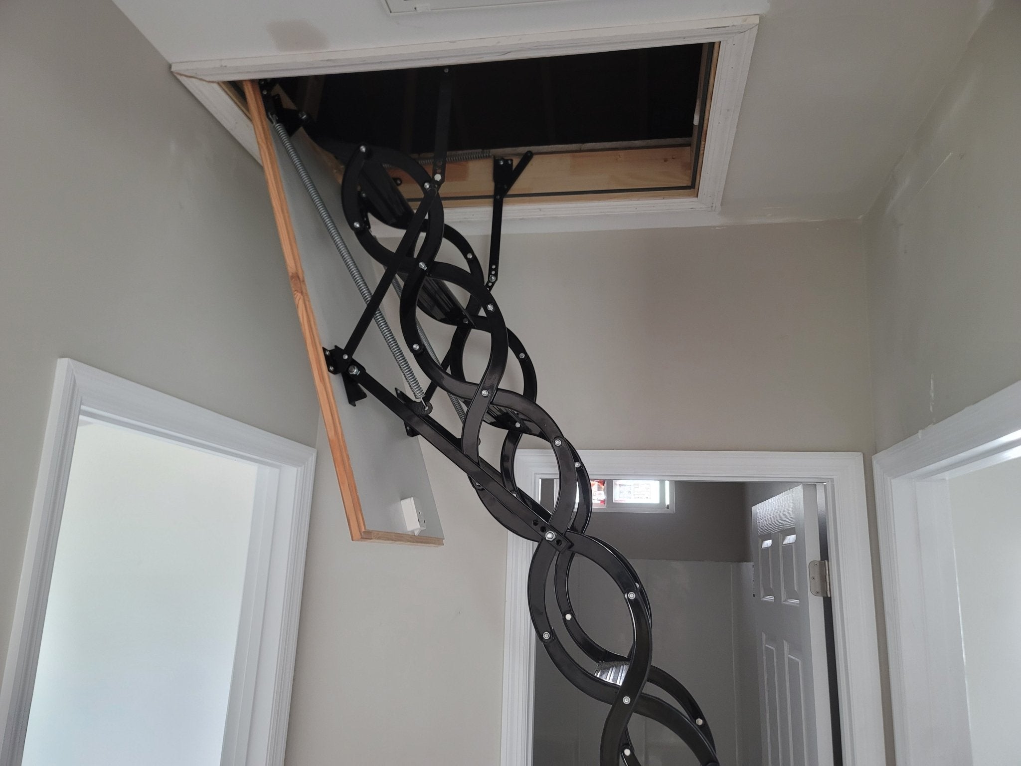 COMP Metal Insulated Scissors Attic Ladder 9 ft - 9.5 ft (Rough Opening: 24.25" x 39.75") with 352 - lb Load Capacity - Garage Rebel